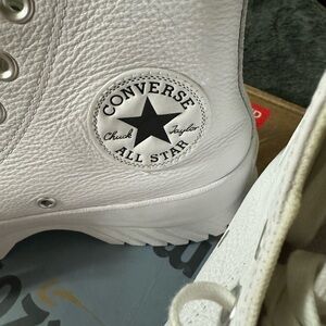 White leather Chuck Taylor high tops